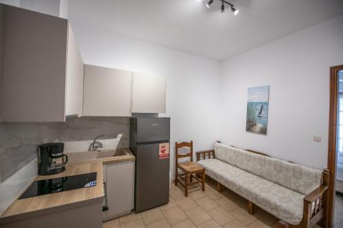 Kuchyň nebo kuchyňský kout v ubytování Lilian Beachfront Apartments