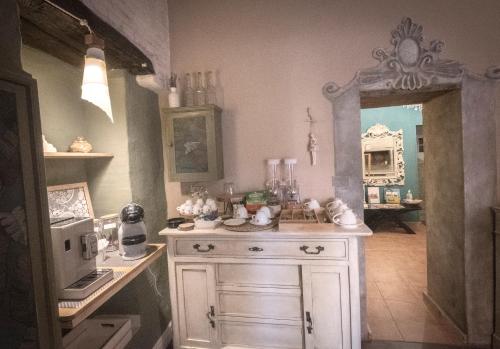A kitchen or kitchenette at Costa Bed and Breakfast