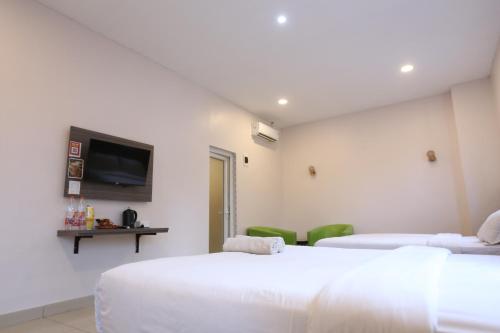 Katil atau katil-katil dalam bilik di De'Tonga Hotel