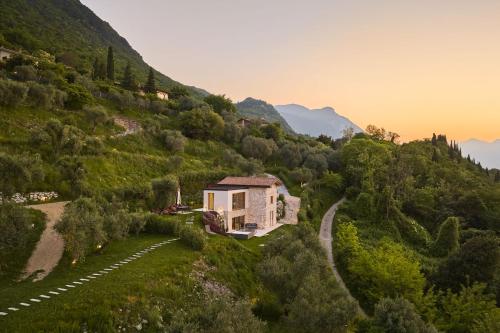 a house on the side of a mountain at Colago Private Villas Lake Garda in Toscolano Maderno