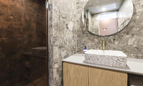 Koupelna v ubytování Hotel Badada