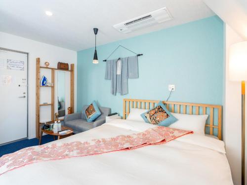 เตียงในห้องที่ Kiba no Tsuru Carane Hotel - Vacation STAY 09997v