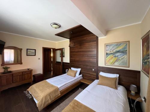Ένα ή περισσότερα κρεβάτια σε δωμάτιο στο Villa De Niro