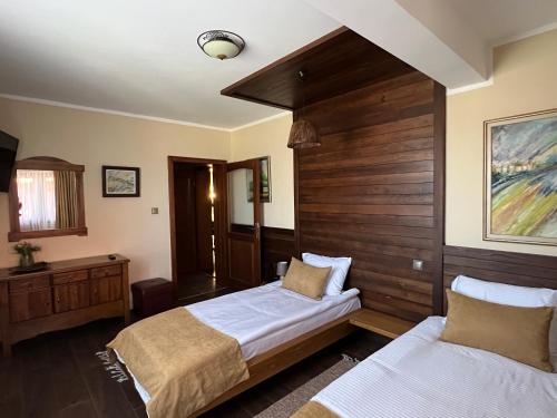 Ένα ή περισσότερα κρεβάτια σε δωμάτιο στο Villa De Niro