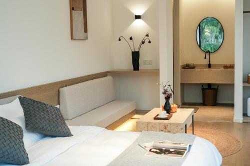 a living room with a couch and a table at My Home in Shanghai