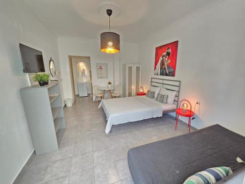 A bed or beds in a room at Oneiropagida