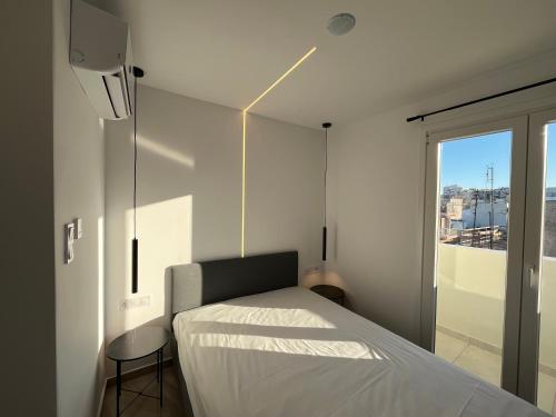 Ένα ή περισσότερα κρεβάτια σε δωμάτιο στο Central -III- Room