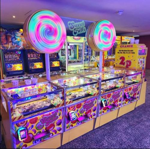 a pinball court with a bunch of pinball machines at 36 Lighthouse View in Lossiemouth
