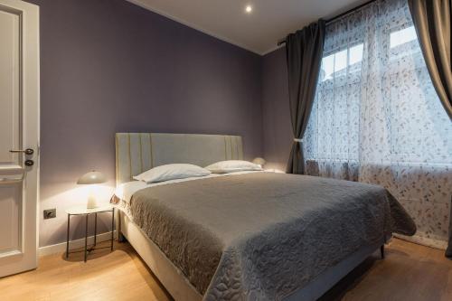 Postel nebo postele na pokoji v ubytování Casa Neva Šibenik