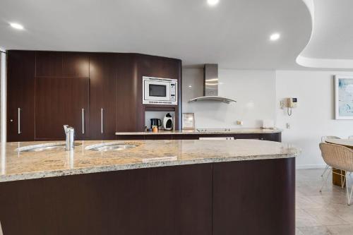 Una cocina o zona de cocina en Sirocco 202