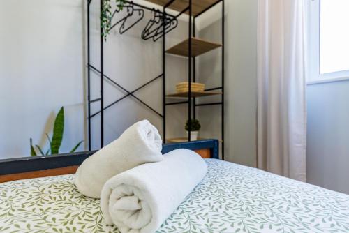 Ένα ή περισσότερα κρεβάτια σε δωμάτιο στο Kali Vice Surf Villa