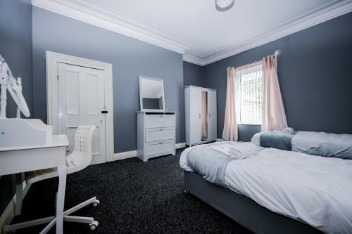 Katil atau katil-katil dalam bilik di Humble Home NE 2
