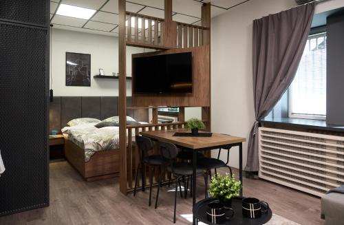 Ένα ή περισσότερα κρεβάτια σε δωμάτιο στο Downtown Boutique Apartments
