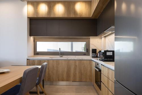 Η κουζίνα ή μικρή κουζίνα στο Nūa Residence - Beach at Your Doorstep by etouri