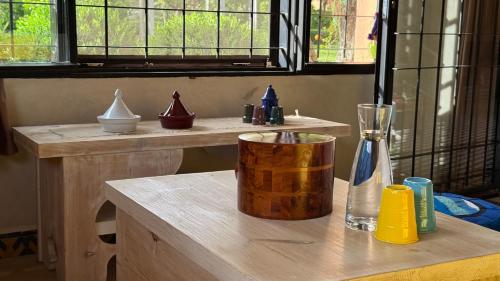 a wooden container sitting on top of a table at Suite - Dar Tidyan Maison d'Hôtes - Ourika Valley in Igzi Ou Fella