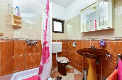 Kúpeľňa v ubytovaní Apartments Slavica 1356