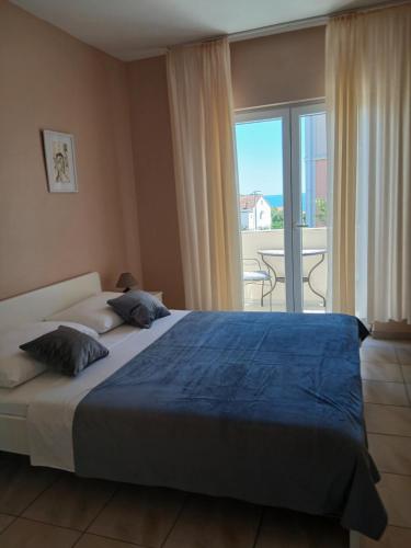 Voodi või voodid majutusasutuse Apartmani Goran Orebić toas