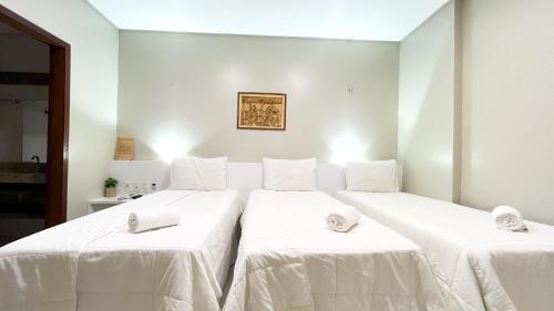 Postel nebo postele na pokoji v ubytování Hotel Padre Cícero