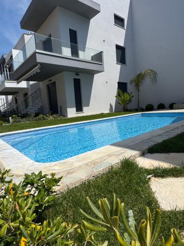 Πισίνα στο ή κοντά στο Paralia Ofriniou Oasis Apartment with Swimming Pool Access and Starlink WIFI