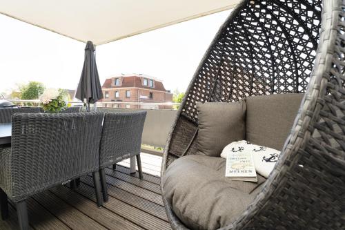Posezení v ubytování Ostseequartier Ruhe-Deck