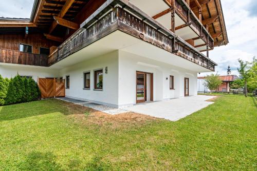 an image of a house with a yard at Haus Katharina 2 in Inzell