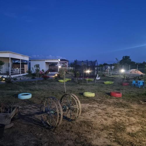 a group of frisbees in a yard at night at Agroktima in Arta