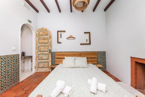Ένα ή περισσότερα κρεβάτια σε δωμάτιο στο Kali Vice Surf Villa