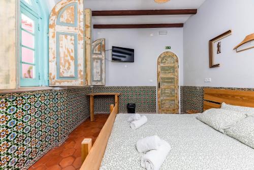 Ένα ή περισσότερα κρεβάτια σε δωμάτιο στο Kali Vice Surf Villa