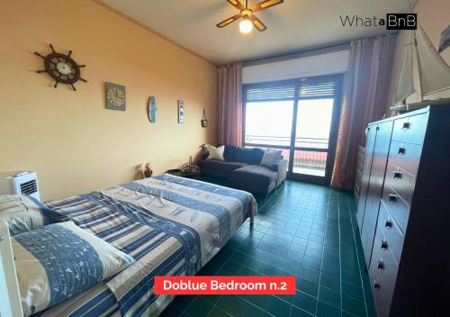 Postel nebo postele na pokoji v ubytování Bergeggi - Appartamento Fronte Mare