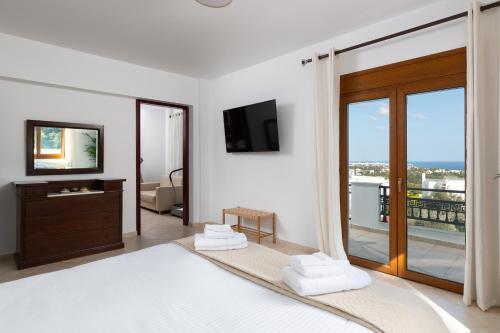 Ένα ή περισσότερα κρεβάτια σε δωμάτιο στο Villa Annatoli