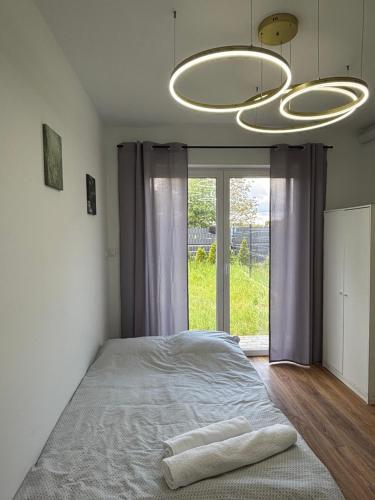 Postel nebo postele na pokoji v ubytování Studio Hop To Wrocław