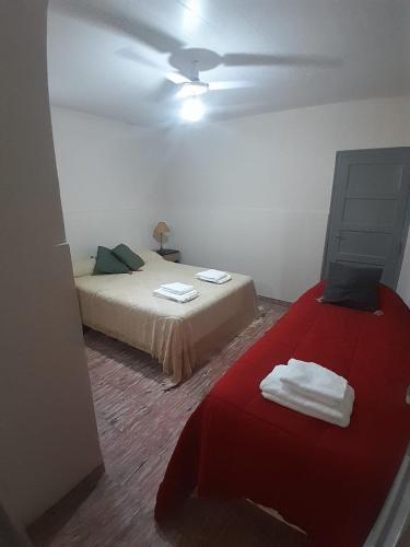 Ένα ή περισσότερα κρεβάτια σε δωμάτιο στο Alquiler temporal Santiago Del Estero