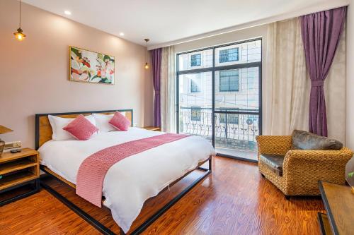 Postel nebo postele na pokoji v ubytování Shanghai nanfeng hotel-上海楠枫花园酒店