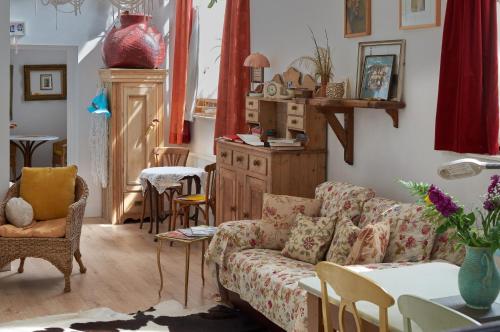 a living room with a couch and a table at Gallery Flat in Newburgh