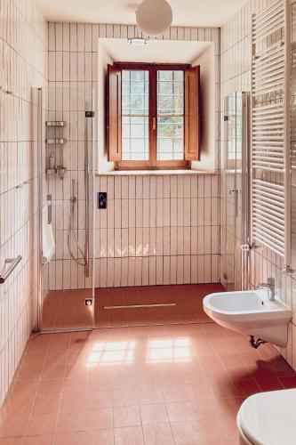 a bathroom with a shower and a sink at Agriturismo Fattoria Poggio di Fiesole in Fiesole