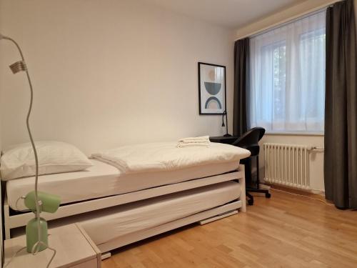 Ένα ή περισσότερα κρεβάτια σε δωμάτιο στο Apartments Flora - Sunflower