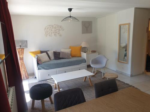 Χώρος καθιστικού στο Appartement 3 étoiles pour 4 personnes avec piscine