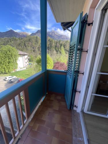 a balcony with a view of the mountains at Hotel Bel Sit in Comano Terme