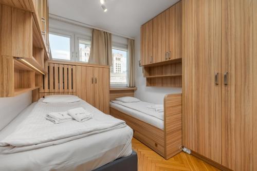Posteľ alebo postele v izbe v ubytovaní Apartament Emilii Plater by Your Freedom