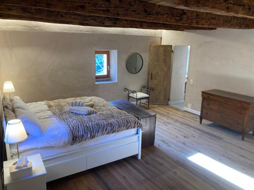 Postel nebo postele na pokoji v ubytování Rustico Spontoi