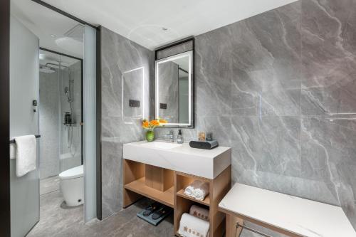 Koupelna v ubytování Dingshe Hotel Guangzhou Shamian Island Yongqingfang Branch