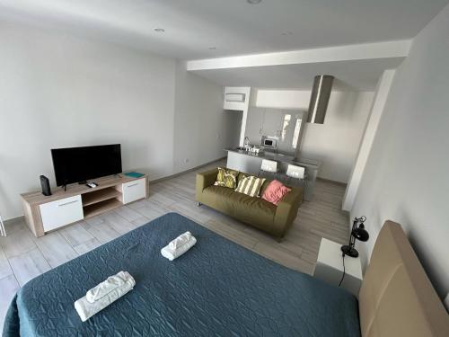Ένα ή περισσότερα κρεβάτια σε δωμάτιο στο Casa Susana