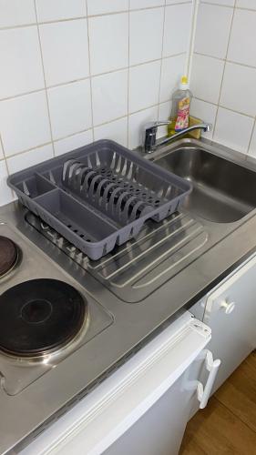 Kuchyň nebo kuchyňský kout v ubytování Studio fonctionnel en plein cœur de paris