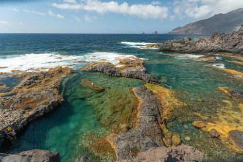 an aerial view of the ocean and rocks at Casa Rosi in Frontera