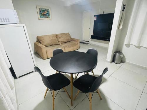 Χώρος καθιστικού στο Casa fundos Eco City 03 Simples e Confortável com 2 Quartos e Garagem