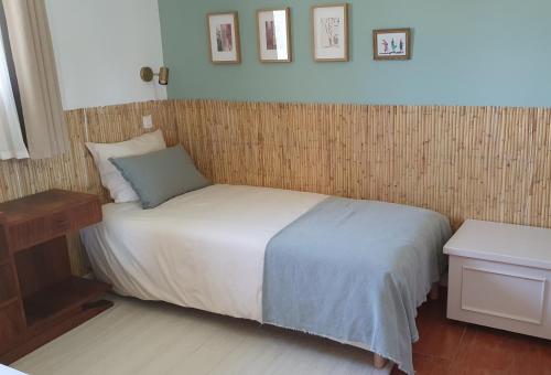 Кровать или кровати в номере Gîte les Syrphes