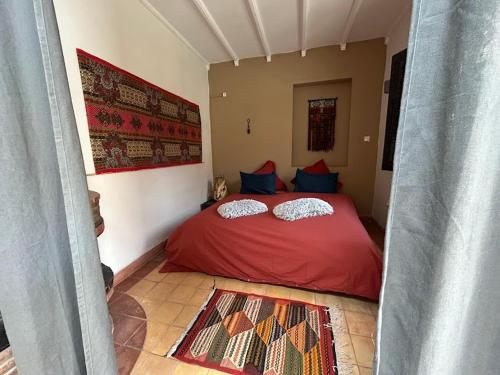 Postel nebo postele na pokoji v ubytování Riad Dar Laure
