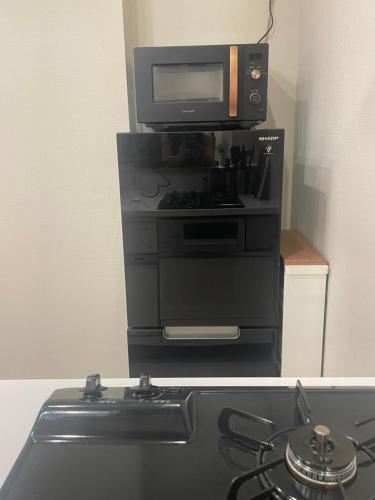 Η κουζίνα ή μικρή κουζίνα στο Ebisu Top floor 1BR Condo with Mount Fuji view