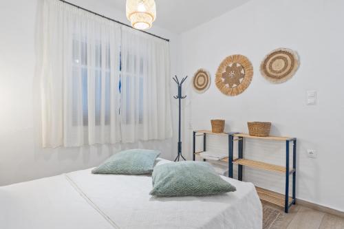 Кровать или кровати в номере OLO House Lefkada