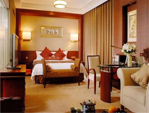 Postel nebo postele na pokoji v ubytování Inn Fine Hotel